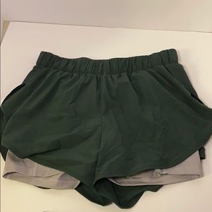 Nike Dri Fit green and grey shorts